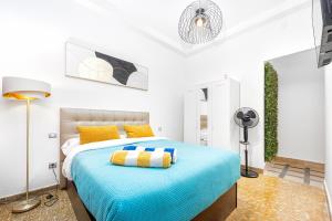 Ένα ή περισσότερα κρεβάτια σε δωμάτιο στο Lunin Apartments