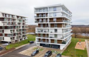 an aerial view of two apartment buildings at Siili Riverview Stay in Tartu