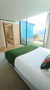 Ένα ή περισσότερα κρεβάτια σε δωμάτιο στο Capim Limão Country House +63 φωτογραφίες