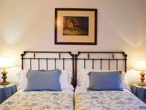 Ένα ή περισσότερα κρεβάτια σε δωμάτιο στο Hotel Los Caspios