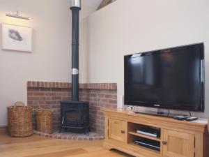 Et tv og/eller underholdning på Barn Owl Cottage