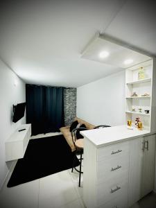 Køkken eller tekøkken på Lindo apartaestudio Bdm luxury