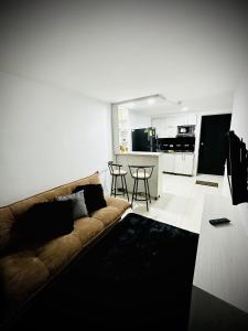 Køkken eller tekøkken på Lindo apartaestudio Bdm luxury