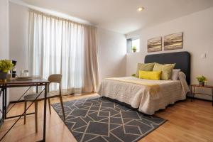 Ένα ή περισσότερα κρεβάτια σε δωμάτιο στο Los Frailes habitación principal +20 φωτογραφίες