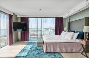 TV/trung tâm giải trí tại Radisson Blu Caledonien Hotel, Kristiansand