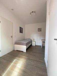 Postel nebo postele na pokoji v ubytování Himmelpforten Loft