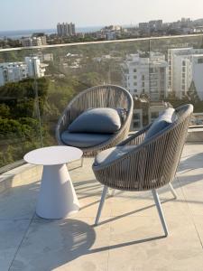 Balkón nebo terasa v ubytování The Nook Nyali + 43 fotografií