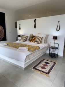 Postel nebo postele na pokoji v ubytování Villa Blanche