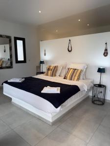 Postel nebo postele na pokoji v ubytování Villa Blanche