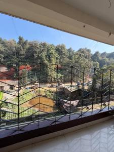 a view from a window in a building at Da Nest in Guwahati