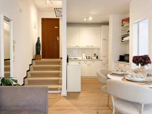 Køkken eller tekøkken på Cosy Getaway mit Schwimmbad und Sauna