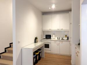 Køkken eller tekøkken på Cosy Getaway mit Schwimmbad und Sauna