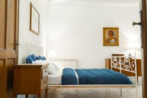 En eller flere senge i et værelse på Villa Svevo Positano