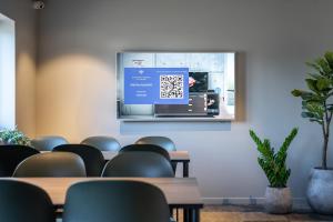 TV a/nebo společenská místnost v ubytování MyHotel Taastrup