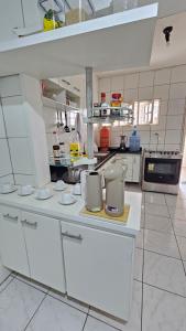 Kuchyň nebo kuchyňský kout v ubytování Casa por temporada em Penedo