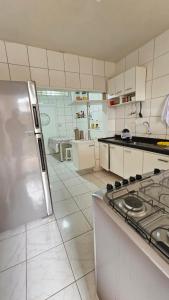 Kuchyň nebo kuchyňský kout v ubytování Casa por temporada em Penedo + 13 fotografií