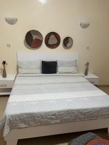 Ένα ή περισσότερα κρεβάτια σε δωμάτιο στο Villa chez Julien