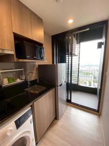 Køkken eller tekøkken på Bangna Apartment Ideo