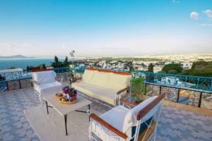 Балкон или терраса в Maison ltoile de Sidi Bou Sad - 360 Sea View
