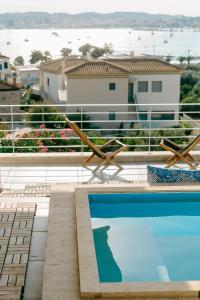 a view of a swimming pool on a house at CASA DI NONNA ANNY in Porto Heli +38 photos