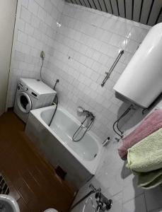 a bathroom with a sink and a toilet and a sink at M comfort in Kumanovo