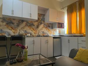 Η κουζίνα ή μικρή κουζίνα στο Chez Camille a Zac Mbao