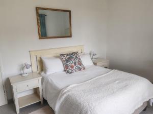 Ένα ή περισσότερα κρεβάτια σε δωμάτιο στο Groenhuisie