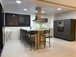 Η κουζίνα ή μικρή κουζίνα στο Maison moderne Villa