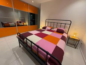 Ένα ή περισσότερα κρεβάτια σε δωμάτιο στο Maison moderne Villa