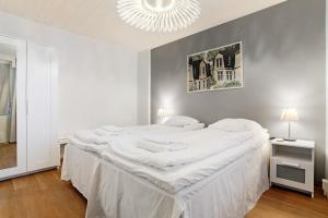 Ένα ή περισσότερα κρεβάτια σε δωμάτιο στο Santalux City Suite, Sauna