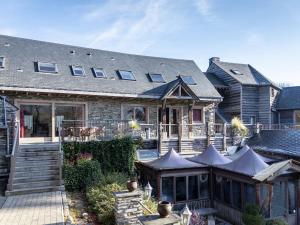 a home with a large house with a patio at Vielsalm Stay with furry friends in Vielsalm +40 photos
