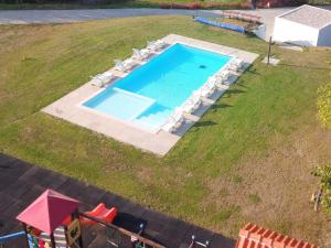 an overhead view of a swimming pool in a yard at Casas da Travessoa in Marco de Canaveses