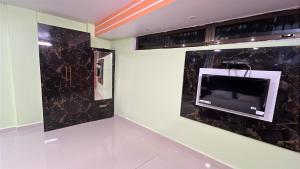 Μια τηλεόραση ή/και κέντρο ψυχαγωγίας στο Ganga Palace Stay Home