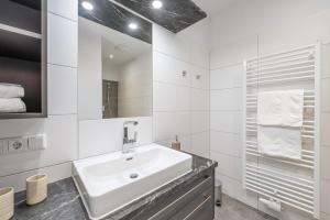 Ванная комната в Drei Berge Blick - by myNests +54 фотографии