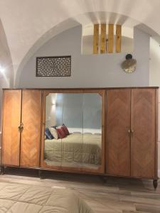 Ένα ή περισσότερα κρεβάτια σε δωμάτιο στο Serio Arcadiae