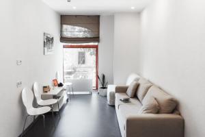 Posezení v ubytování Orange Hotel