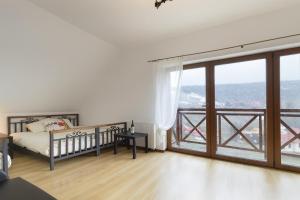 Postel nebo postele na pokoji v ubytování Domek Zieleniec