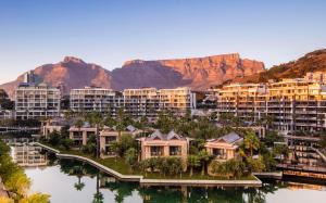 arial view of a resort with mountains in the background at One&Only Cape Town in Cape Town