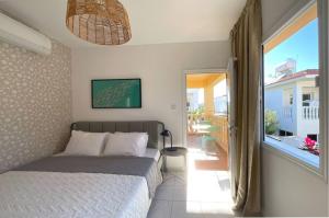 Postel nebo postele na pokoji v ubytování Seaside Villa Luci w jacuzzi