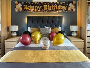 Ένα ή περισσότερα κρεβάτια σε δωμάτιο στο Riverview Lodge