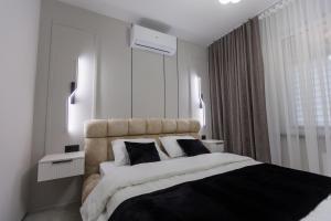 Φωτογραφία από το άλμπουμ του Luna Minimalist Apartment στο Kισινάου