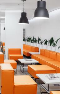 Posezení v ubytování Orange Hotel