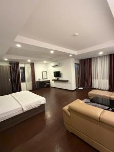 Postel nebo postele na pokoji v ubytování Dolphin Bay Hotel Nha Trang