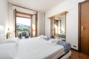 Ένα ή περισσότερα κρεβάτια σε δωμάτιο στο QuattroTrentasei