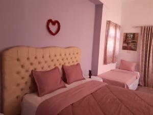 Postel nebo postele na pokoji v ubytování Henchir ejdoud