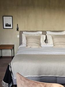 Rúm í herbergi á LA BELLE IDEE