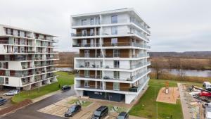 an aerial view of two tall apartment buildings at Cosy River Suite in Tartu