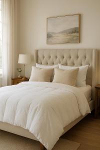 Una cama o camas en una habitación de Hotel elegante