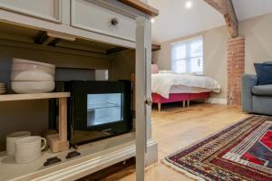 Postel nebo postele na pokoji v ubytování The Malt Loft + 11 fotografií