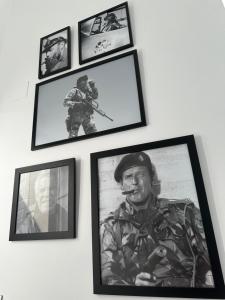 a wall with pictures of a soldier on it at Edificio Resort Gran8Nerja in Nerja